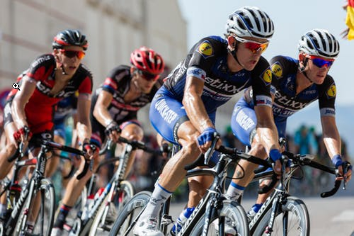 a group of people cycling